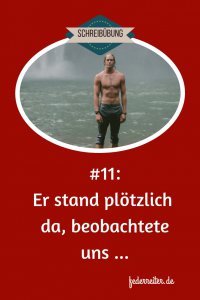 Ein Mann steht mit einer nassen Hose bekleidet vor einem Wasserfall